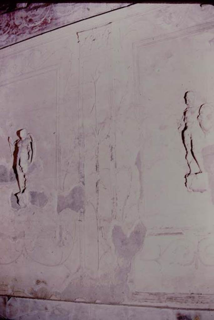 Suburban Baths, Herculaneum, 1975.
Tepidarium, with warriors on white stucco panels set into the east wall . Photo by Stanley A. Jashemski.
Source: The Wilhelmina and Stanley A. Jashemski archive in the University of Maryland Library, Special Collections (See collection page) and made available under the Creative Commons Attribution-Non-Commercial License v.4. See Licence and use details.
J75f0719